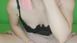 Pretty woman fisting her throat with her fist and masturbates to a shaking orgasm