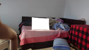 Amateur wife has fun trying on clothes that she cuts.